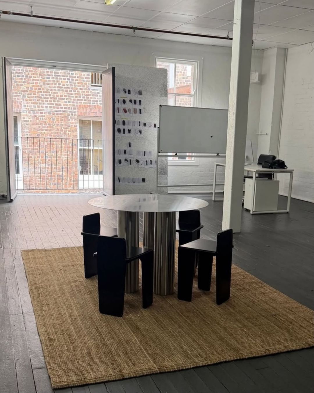 Stainless steel dining table in an office
