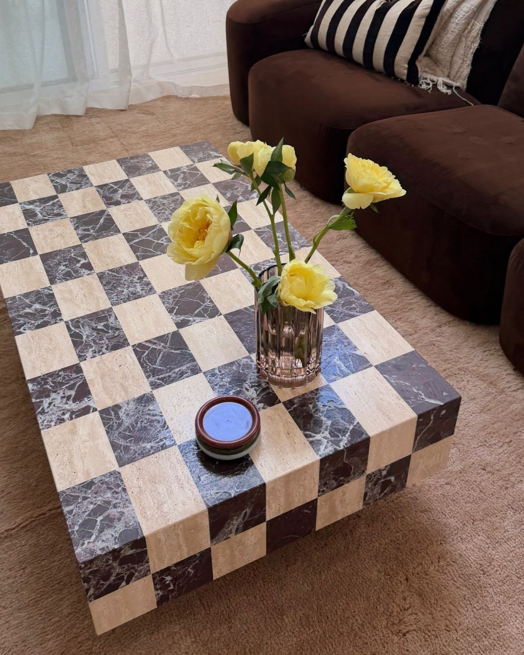 Checkerboard marble coffee table styled
