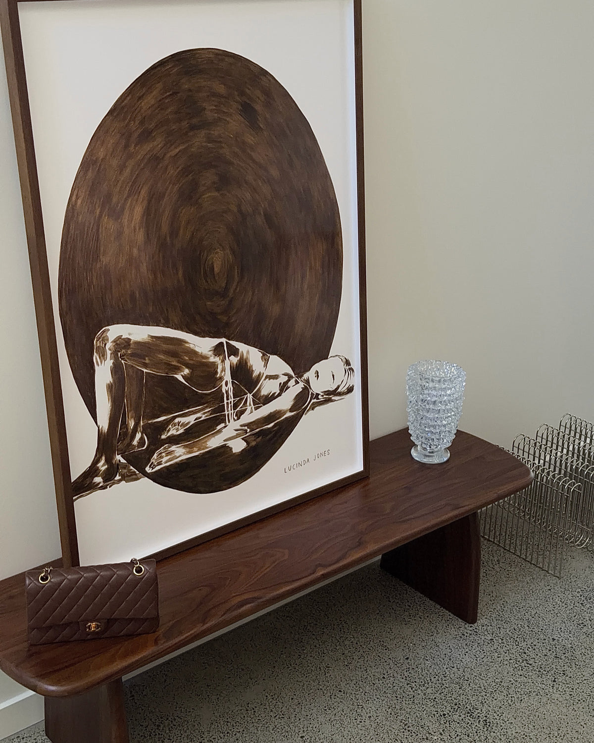 Walnut timber bench seat styled with artwork