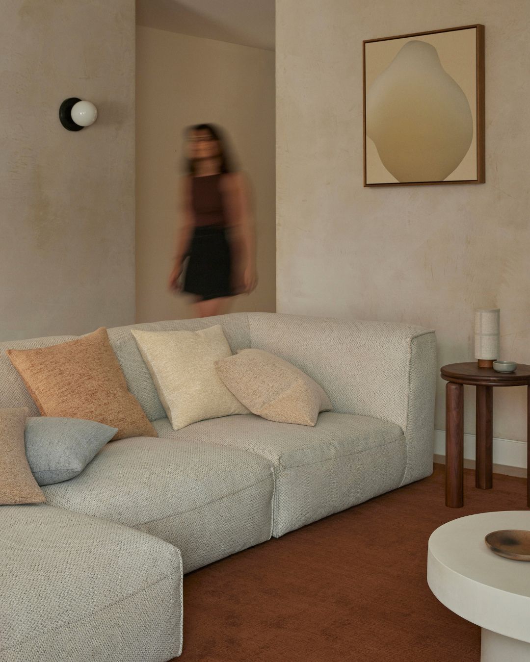 Bombola walnut side table styled in a living room