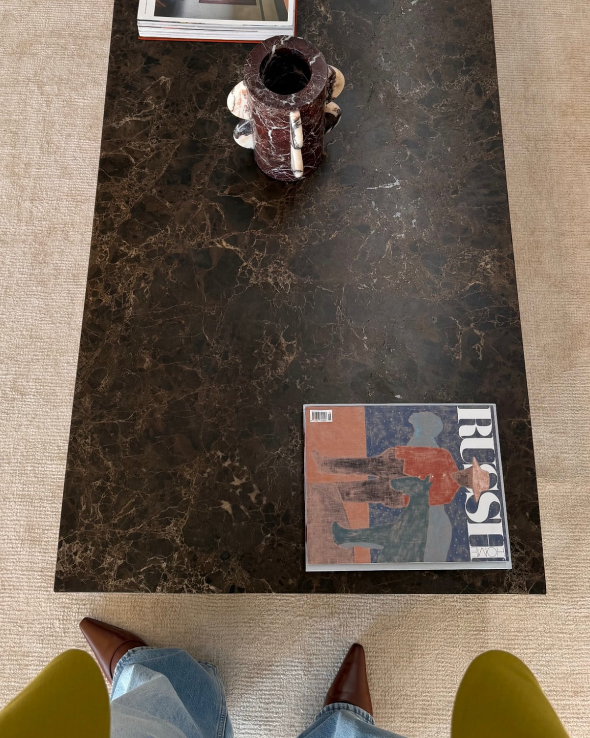 Chocolate marble coffee table styled