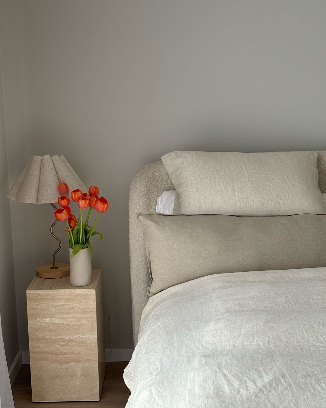 small cream travertine plinth bedside table