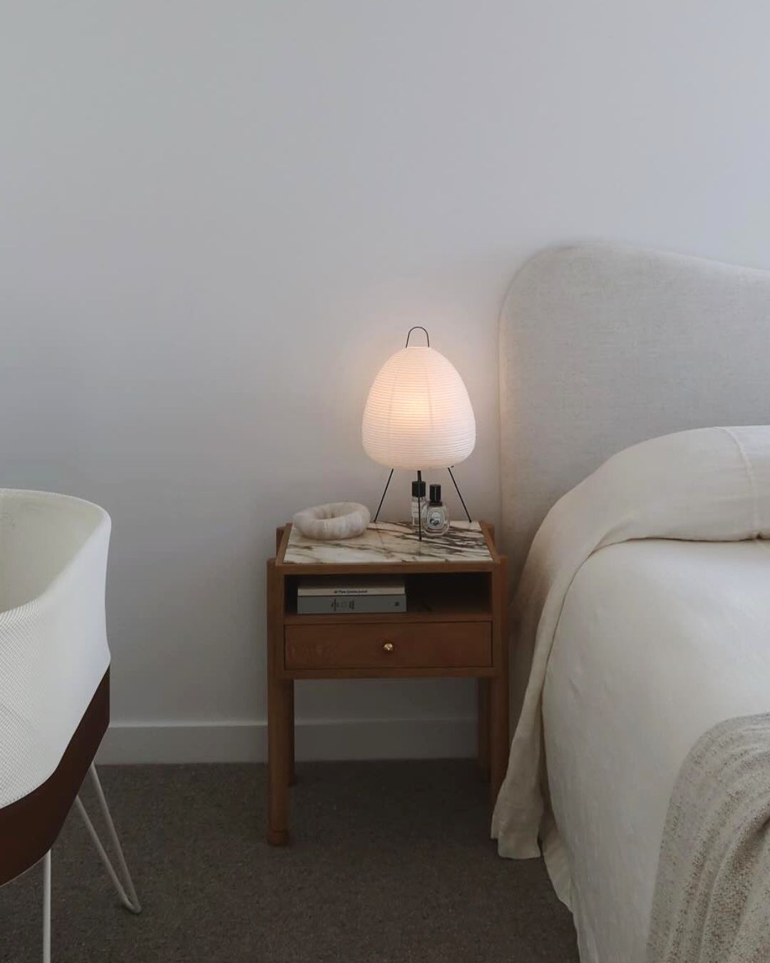 Oak bedside table with marble tabletop