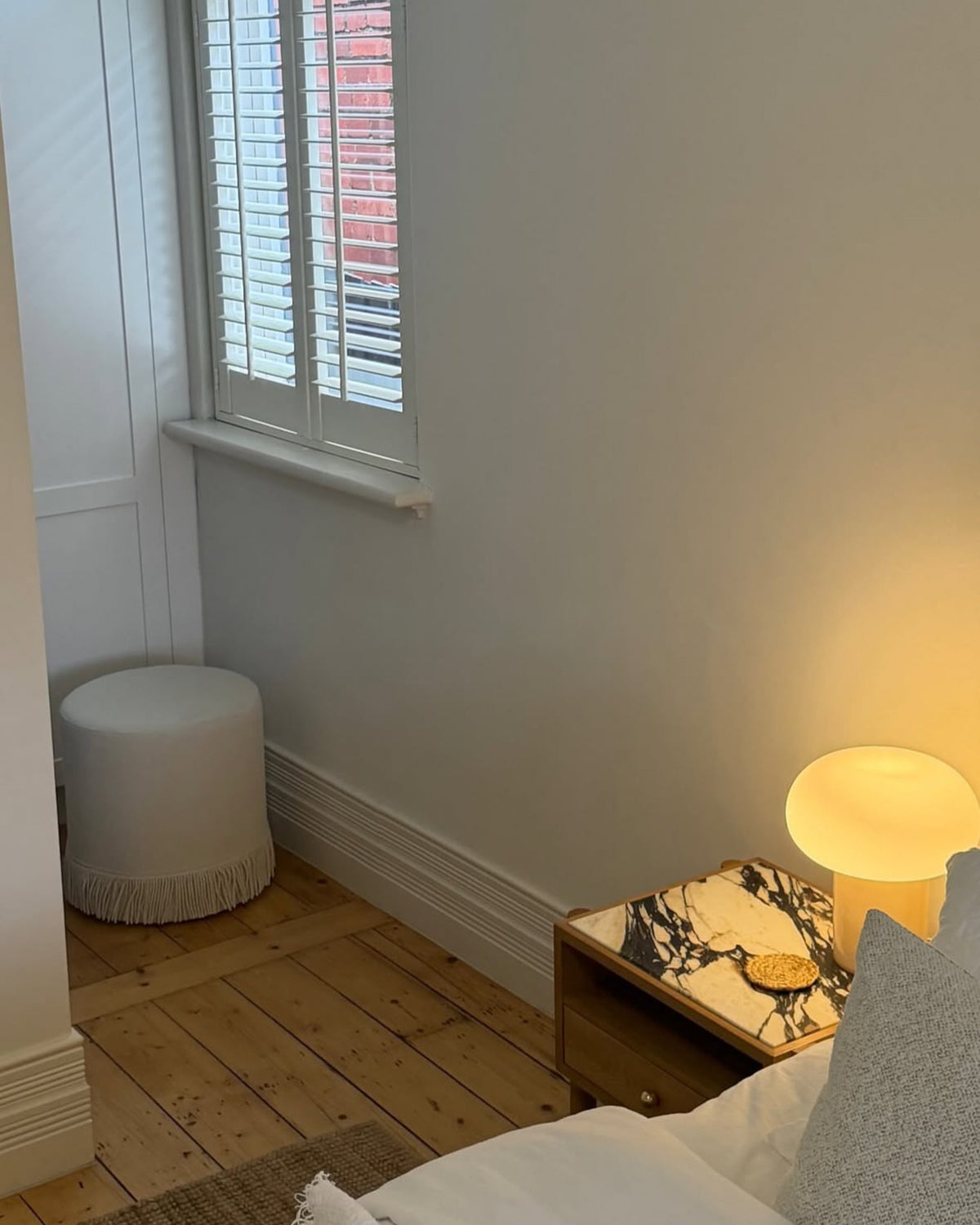 Bedroom styled with a Naomi oak bedside table