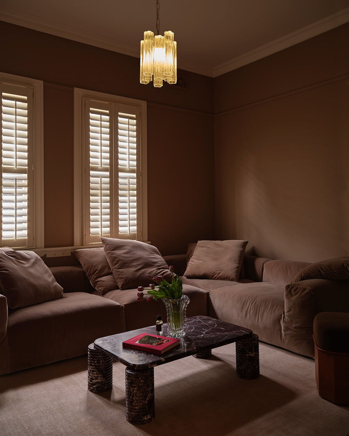 Living room styled with a rosa levanto marble coffee table
