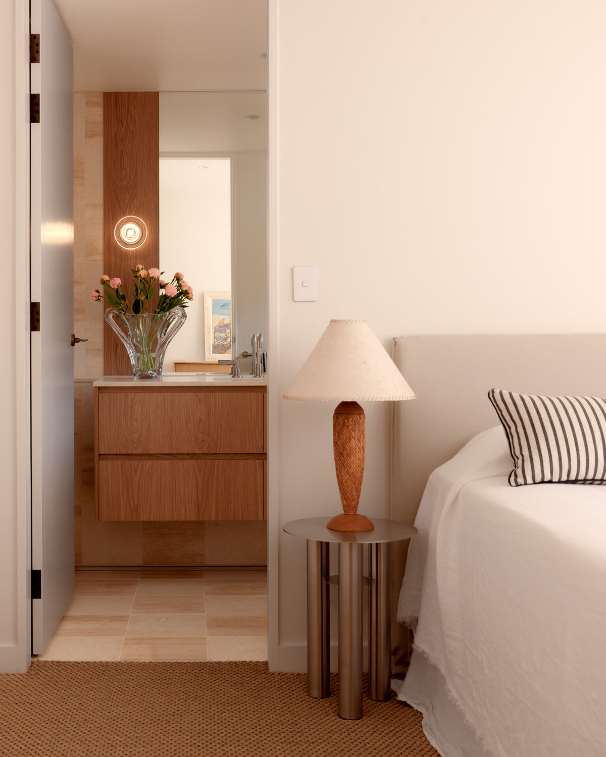 Modern bedroom featuring our stainless steel side table