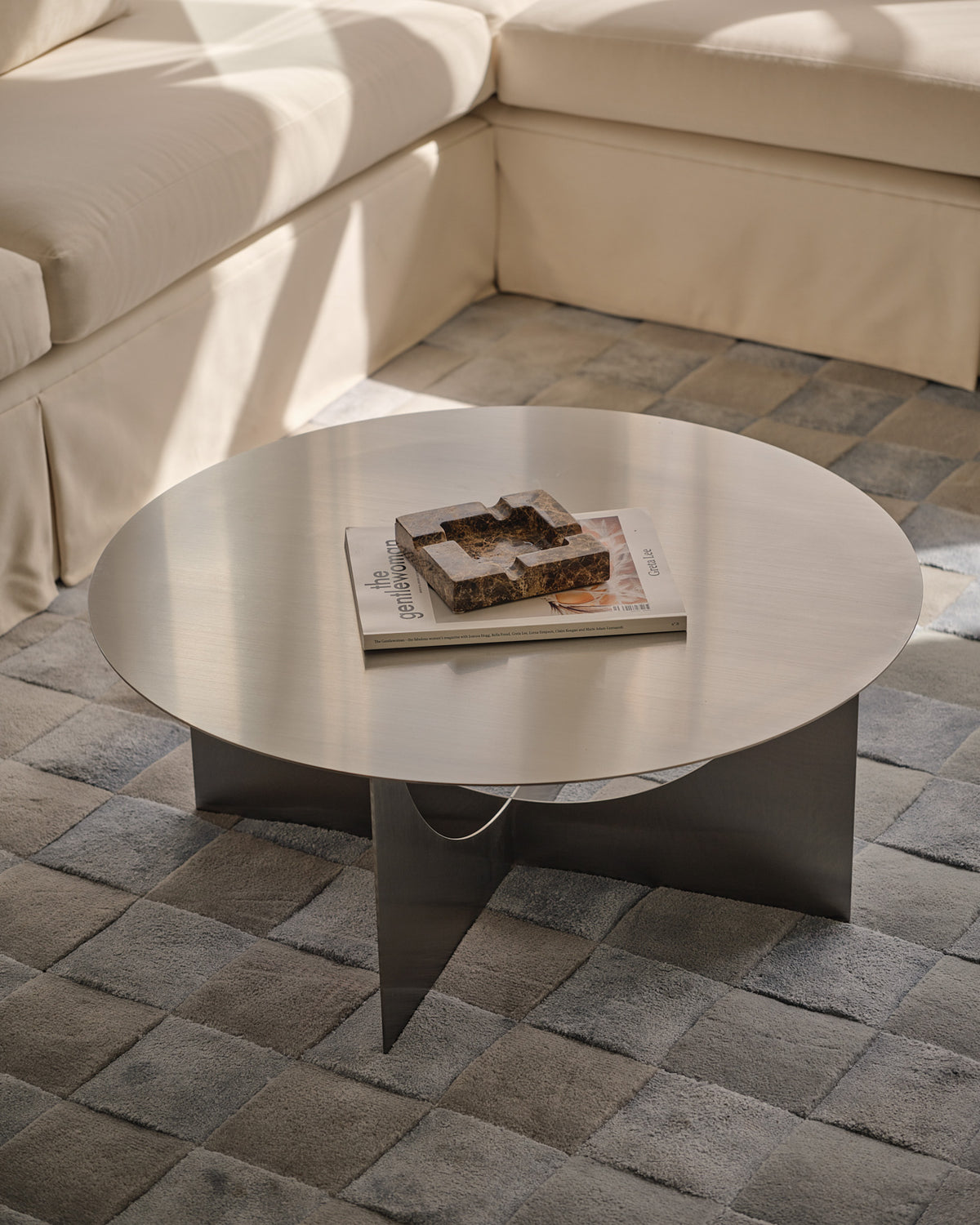 Stainless steel round coffee table styled
