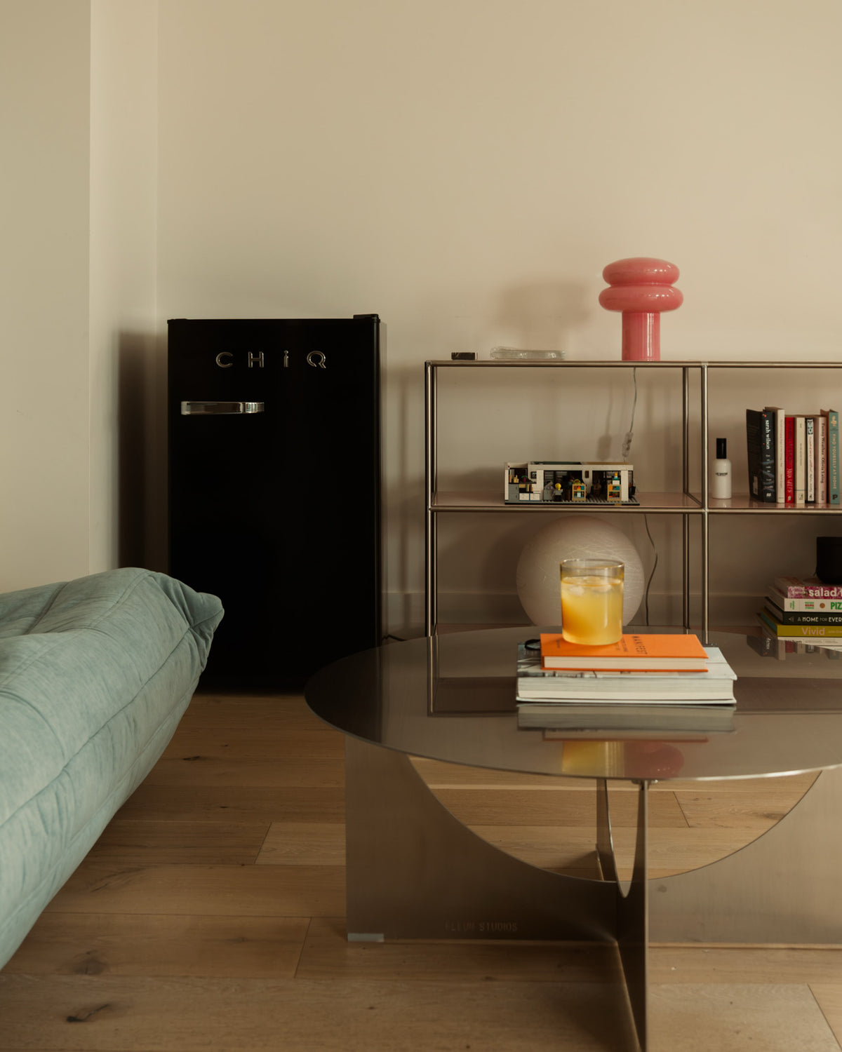 Living room styled with a stainless steel coffee table