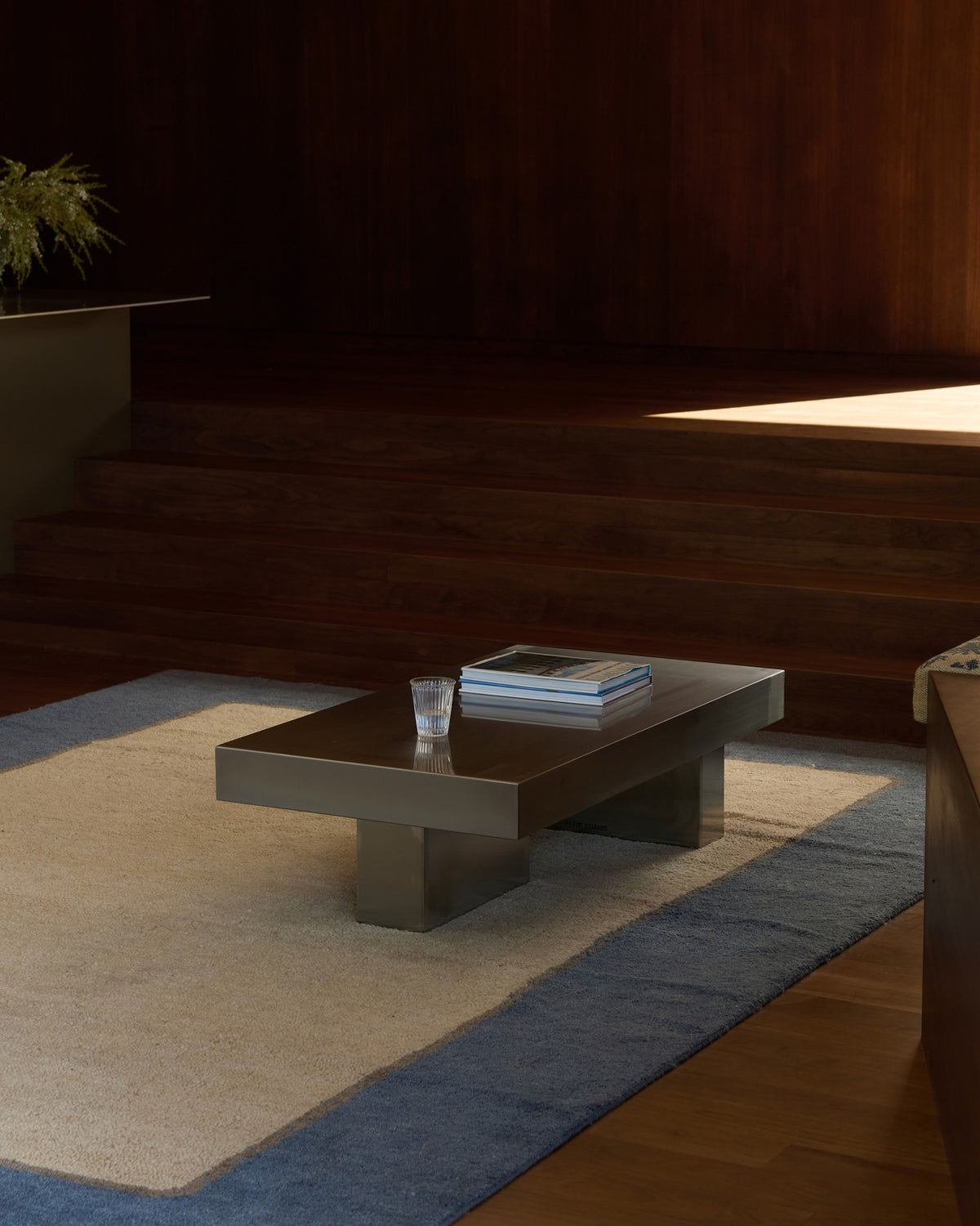 Living room styled with a stainless steel coffee table