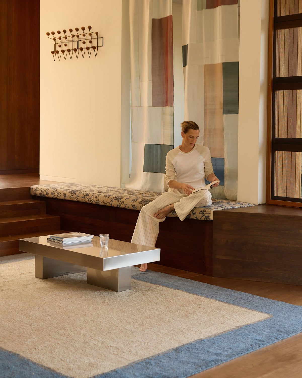 Living room styled with a stainless steel coffee table