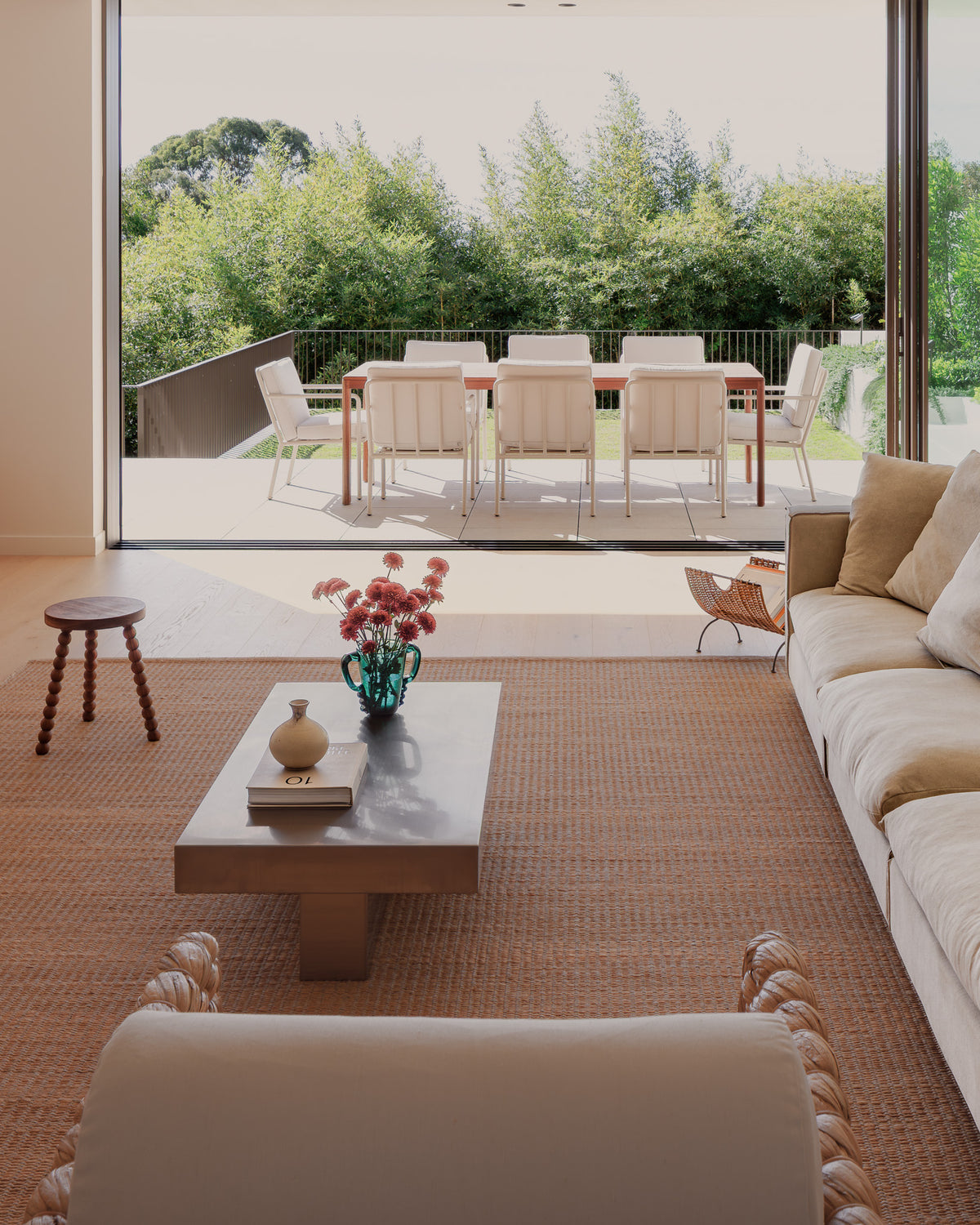 Living room featuring our stainless steel Paris coffee table
