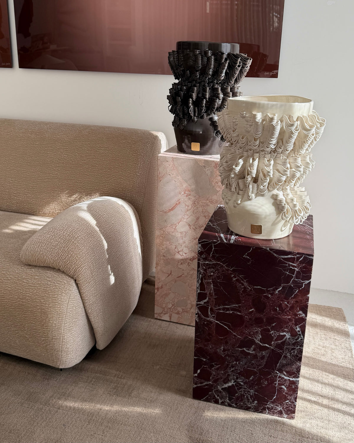 Two plinths next to a couch