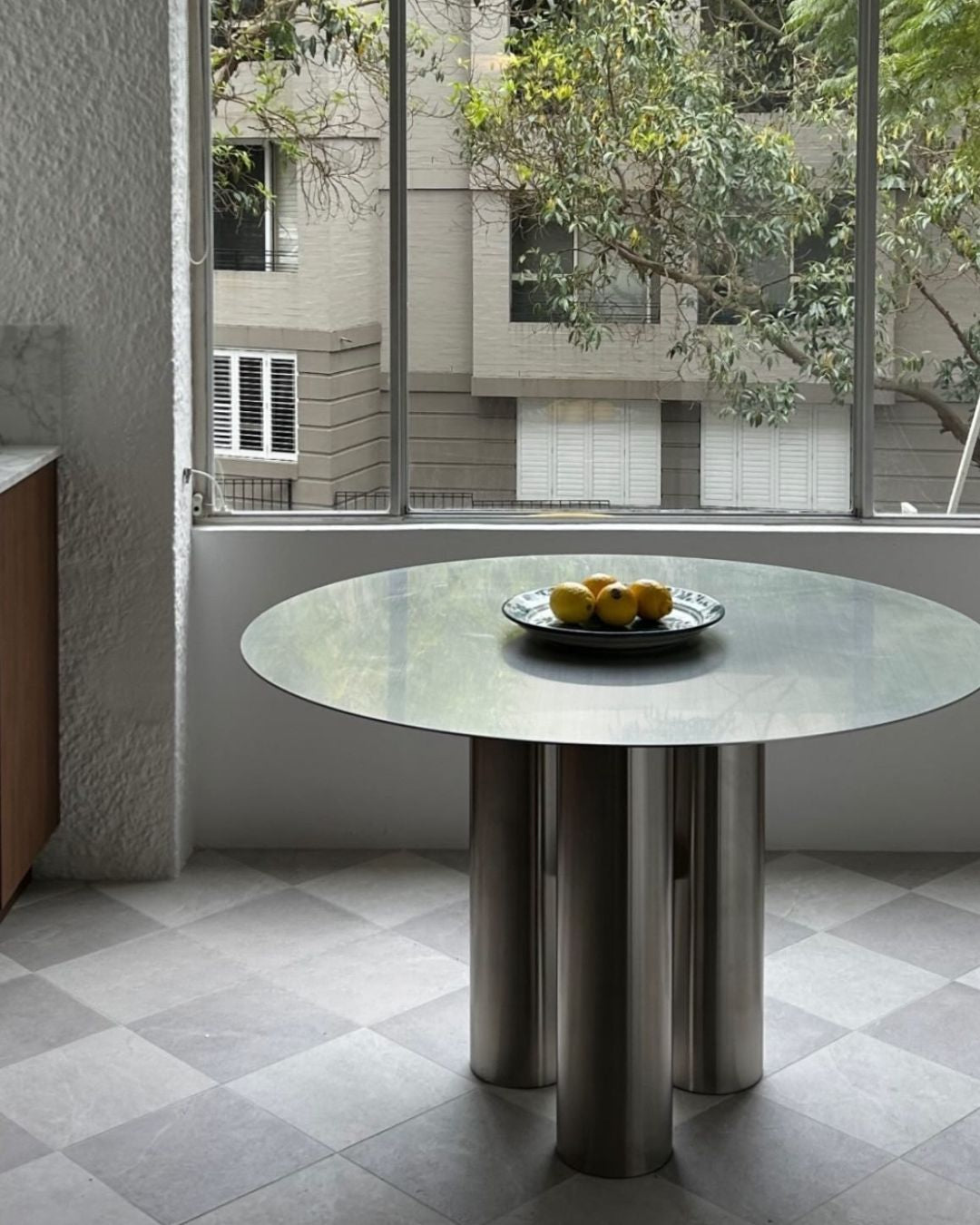 Stainless steel dining table in a dining room