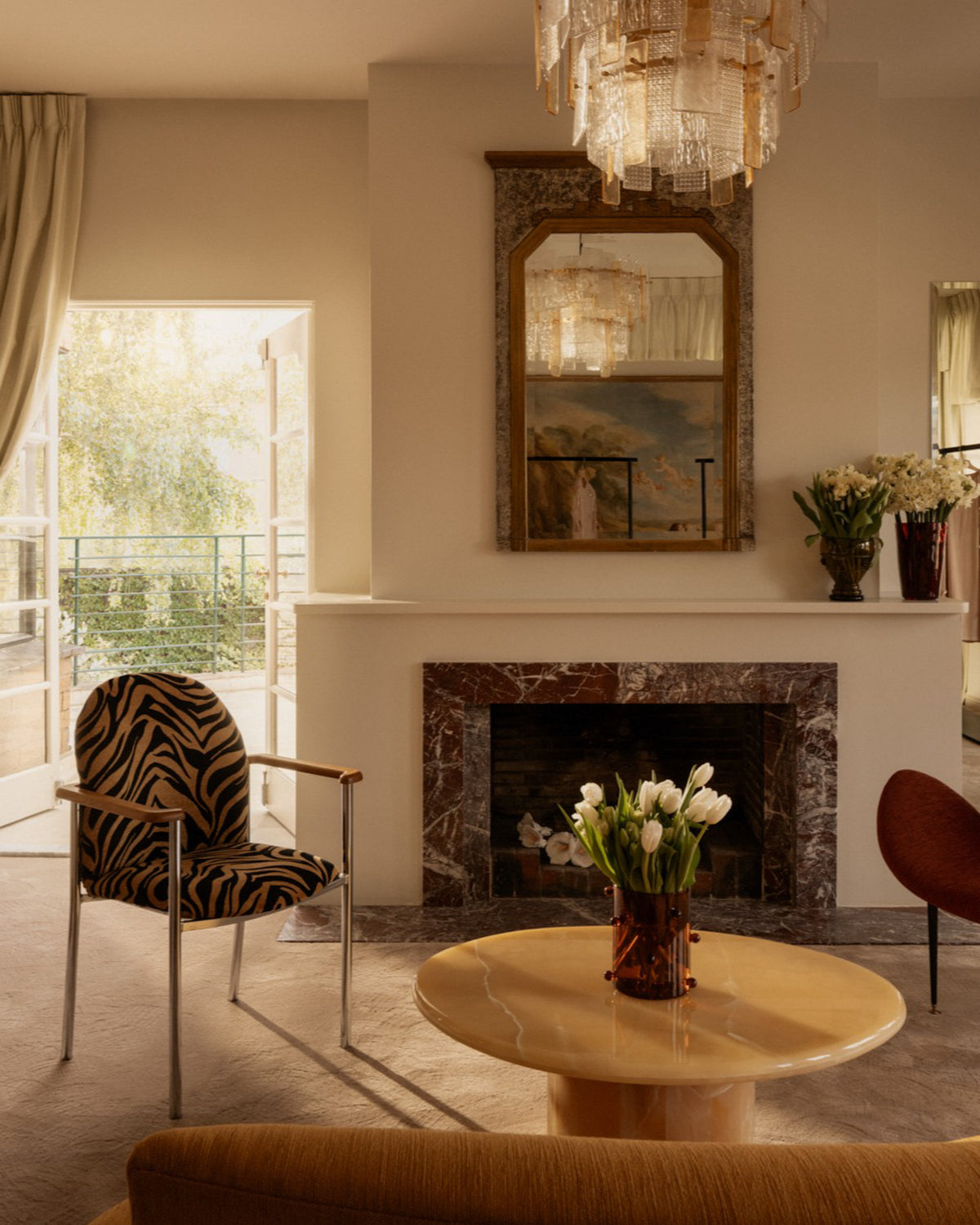 A styled interior room with a caramel onyx coffee table.