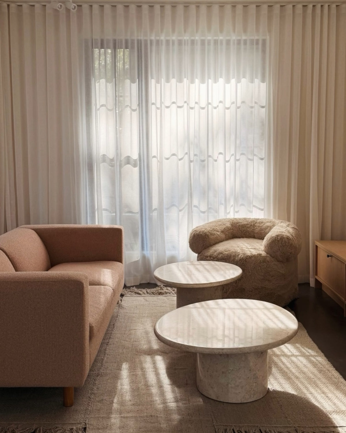 Living room with crema marble coffee tables