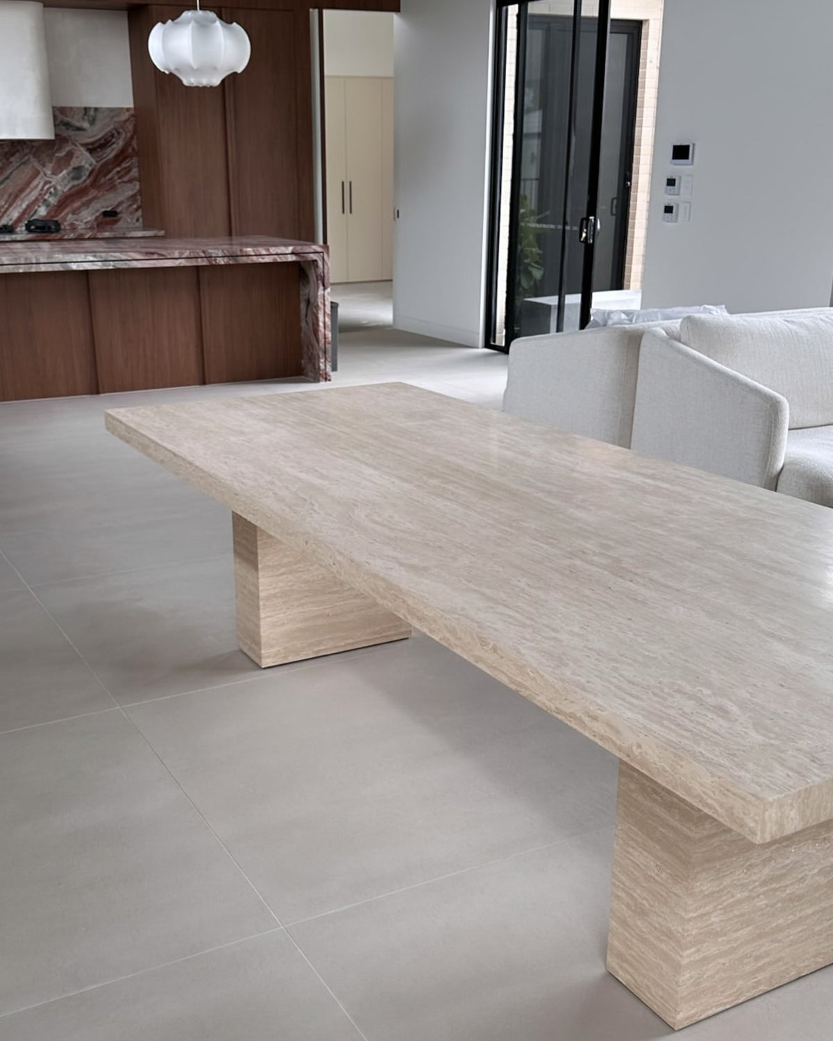 Cream travertine stone dining table