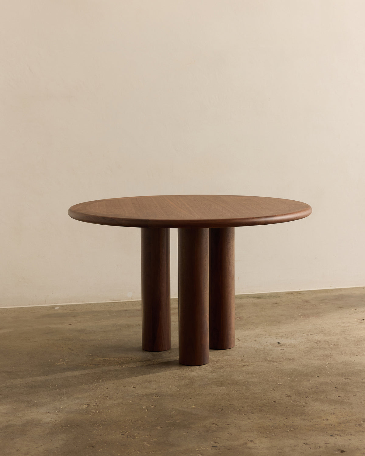 Elio Small Round Dining Table Walnut | by Fleur Studios