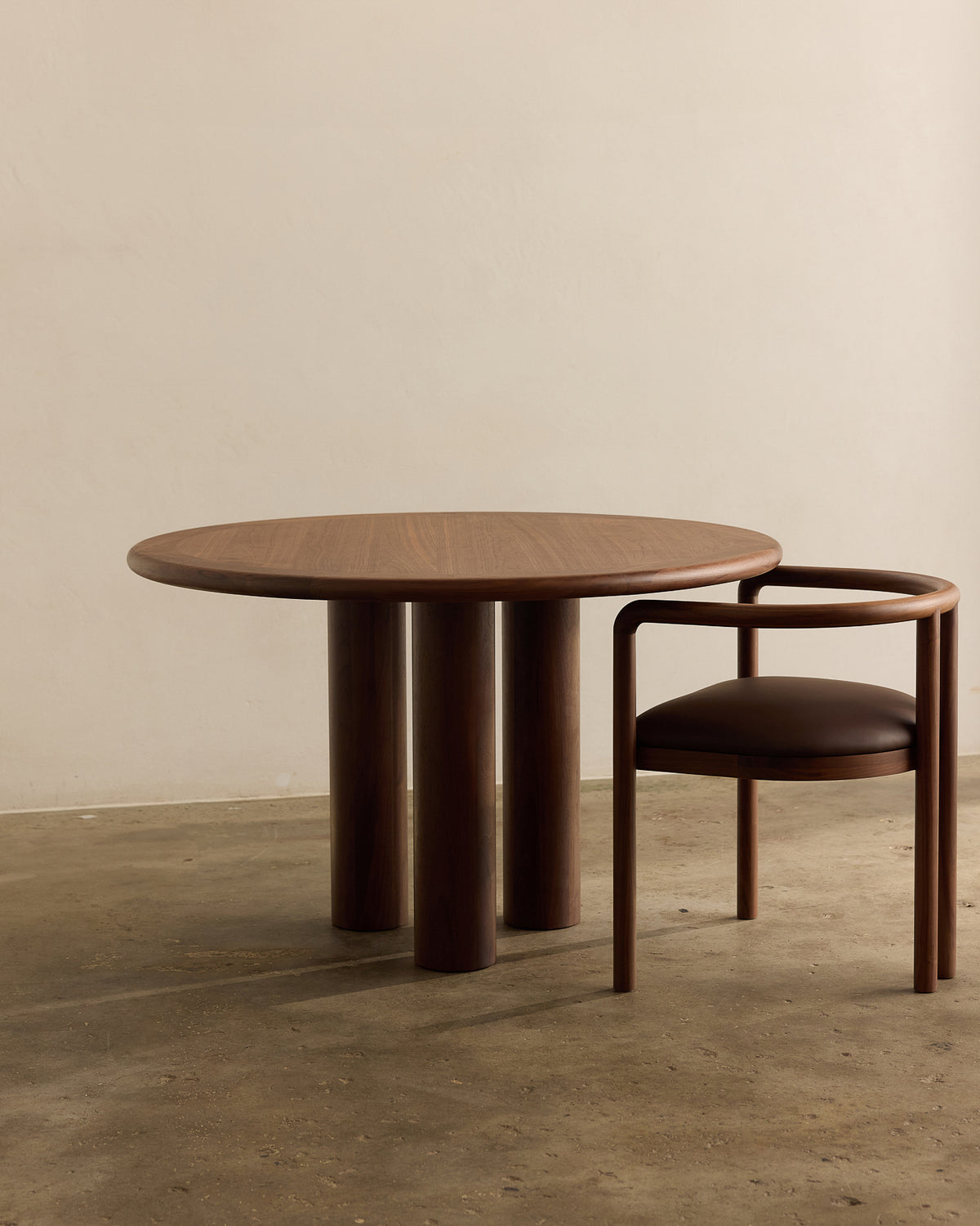 Elio Small Round Dining Table Walnut | by Fleur Studios