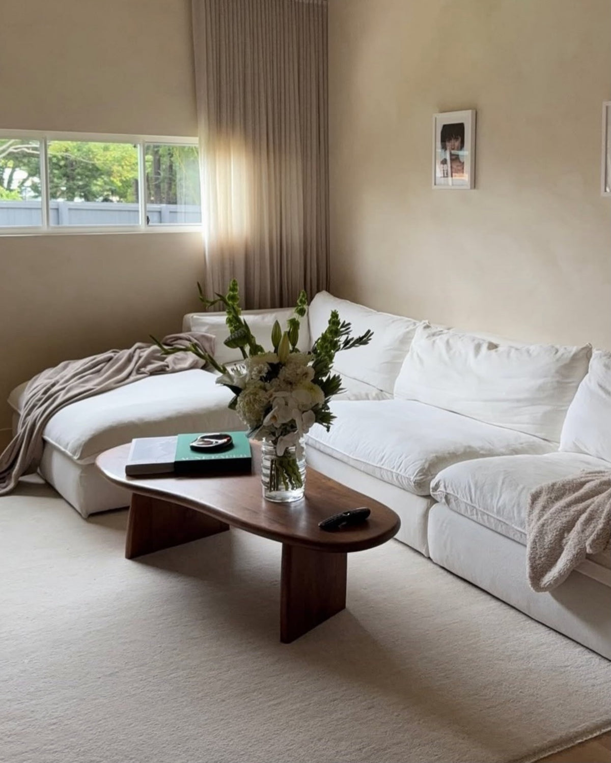Walnut timber coffee table styled in a living room