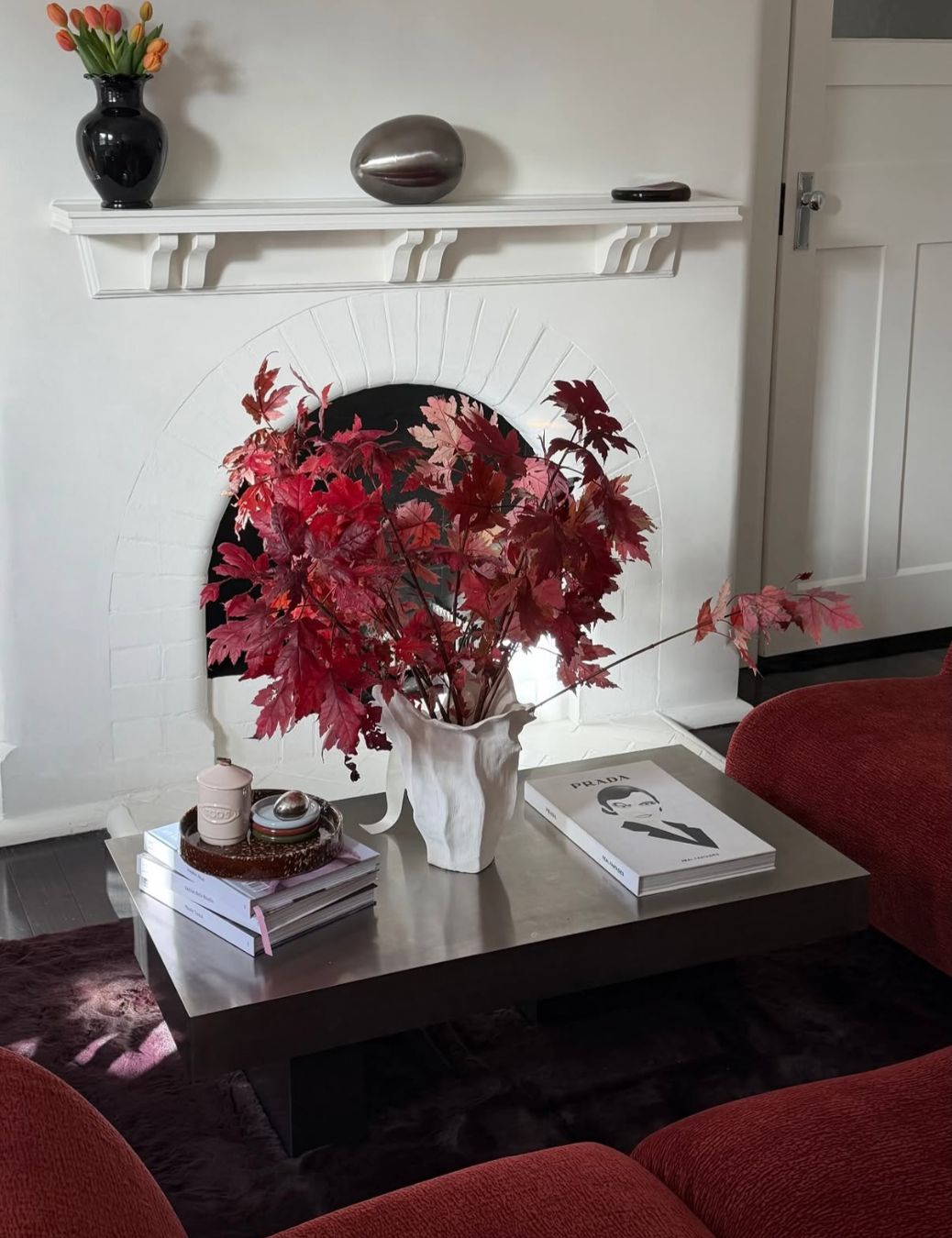 Living room styled with a stainless steel table