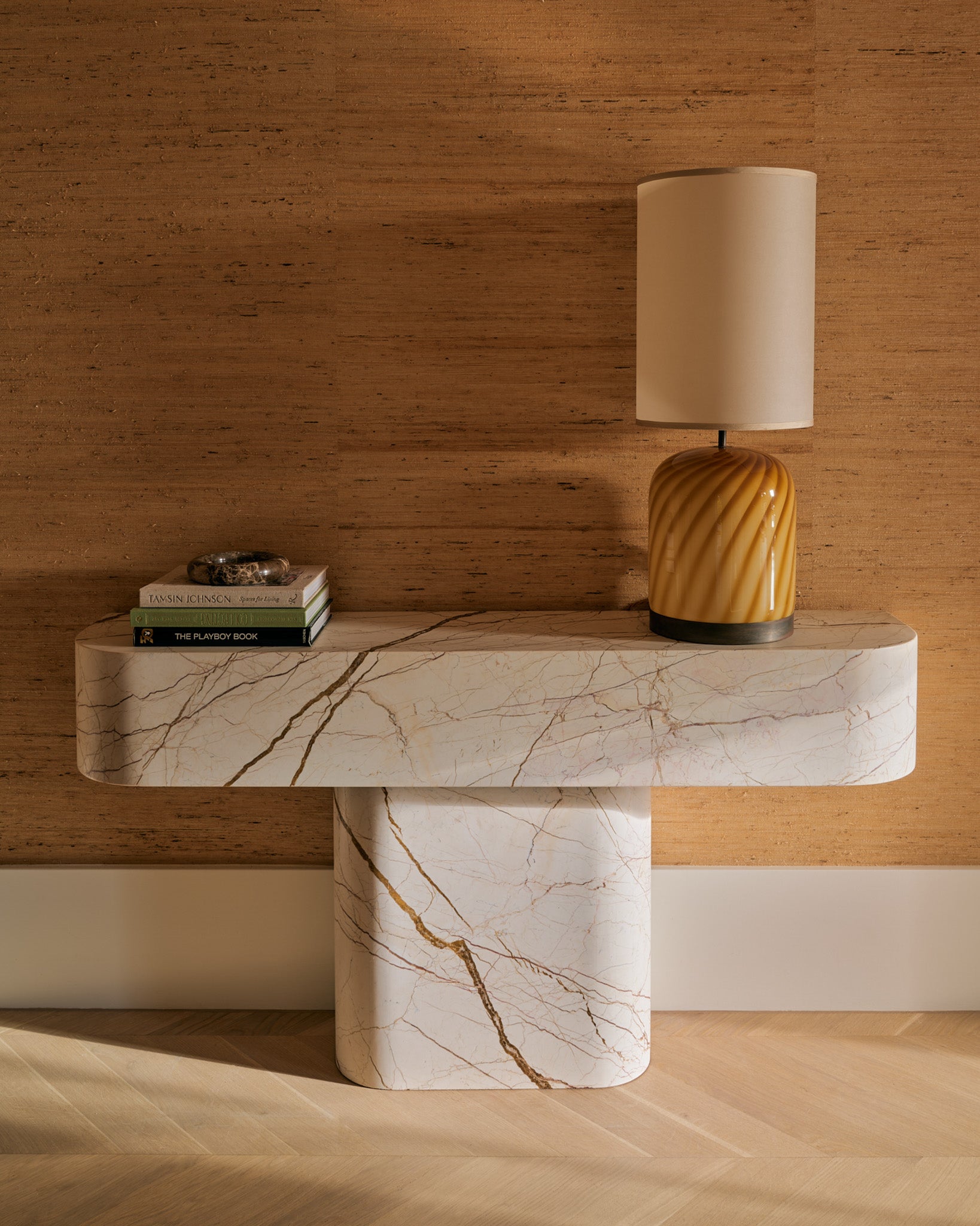 Honeycomb marble console table styled