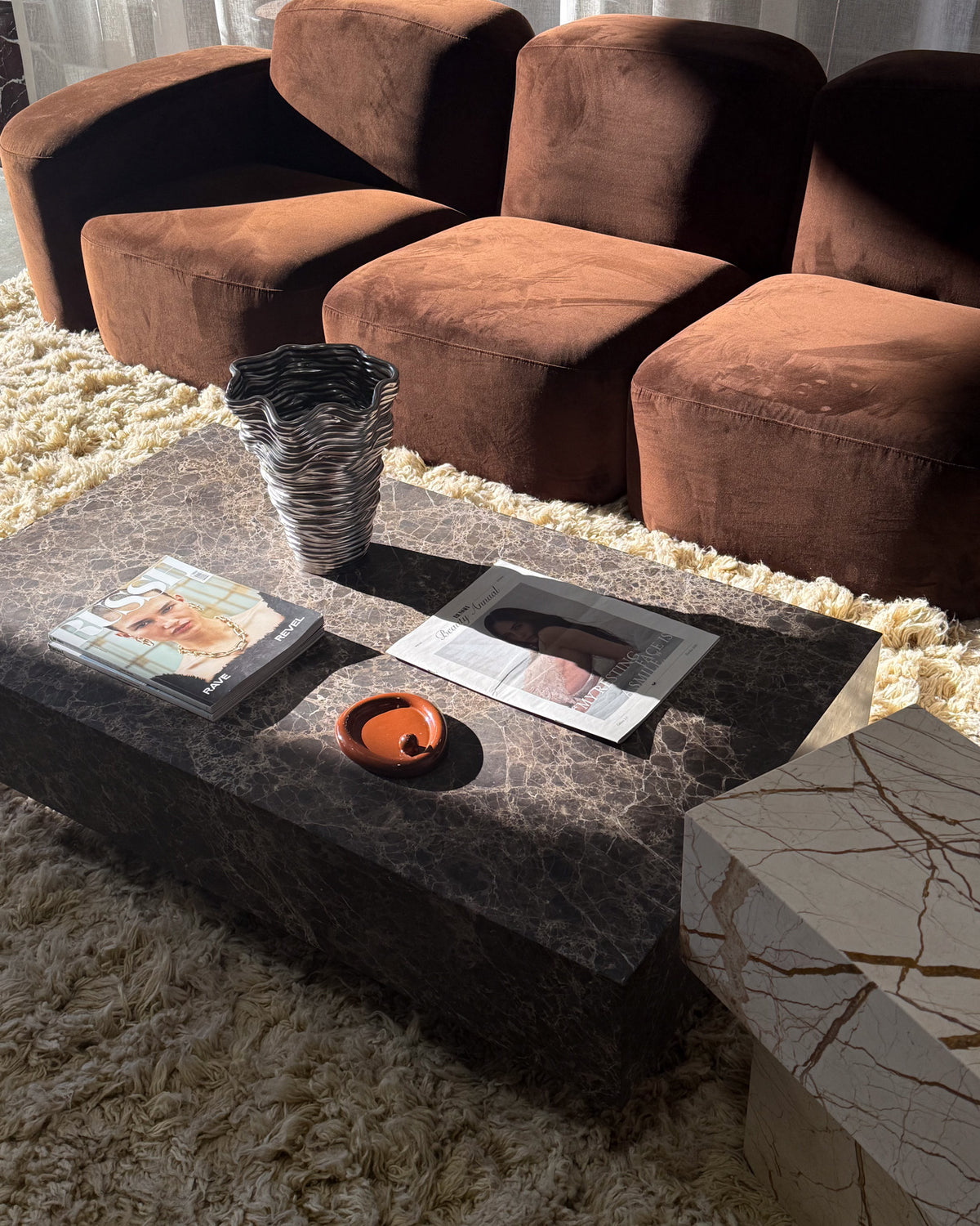 Butter chocolate marble coffee table styled