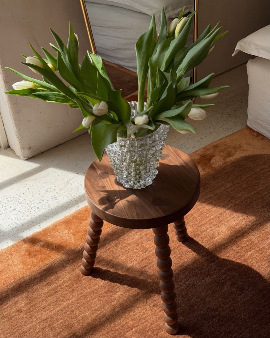 Small wooden side table styled