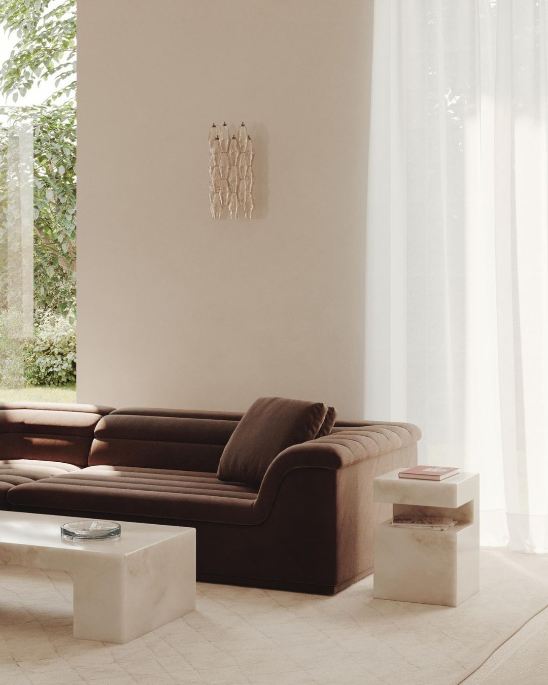 A white onyx side table styled in a living room
