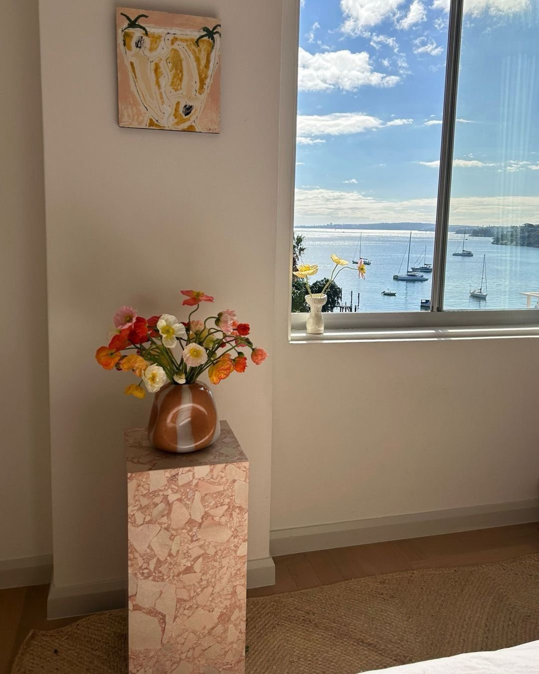 Plinth side table styled by a window
