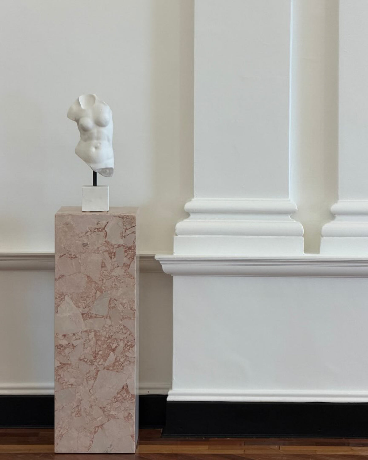 Desert rose marble plinth styled