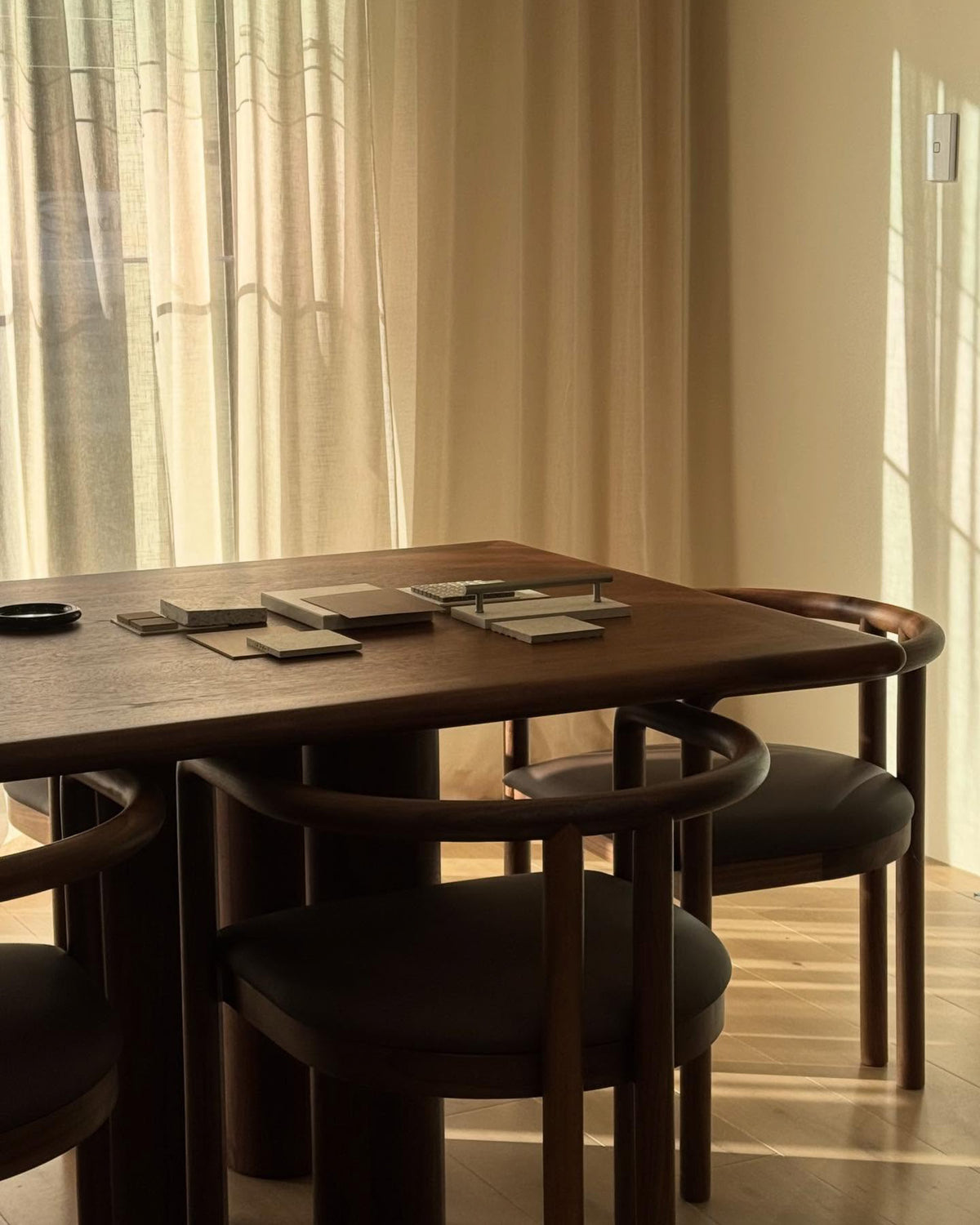 Walnut timber dining table and chairs