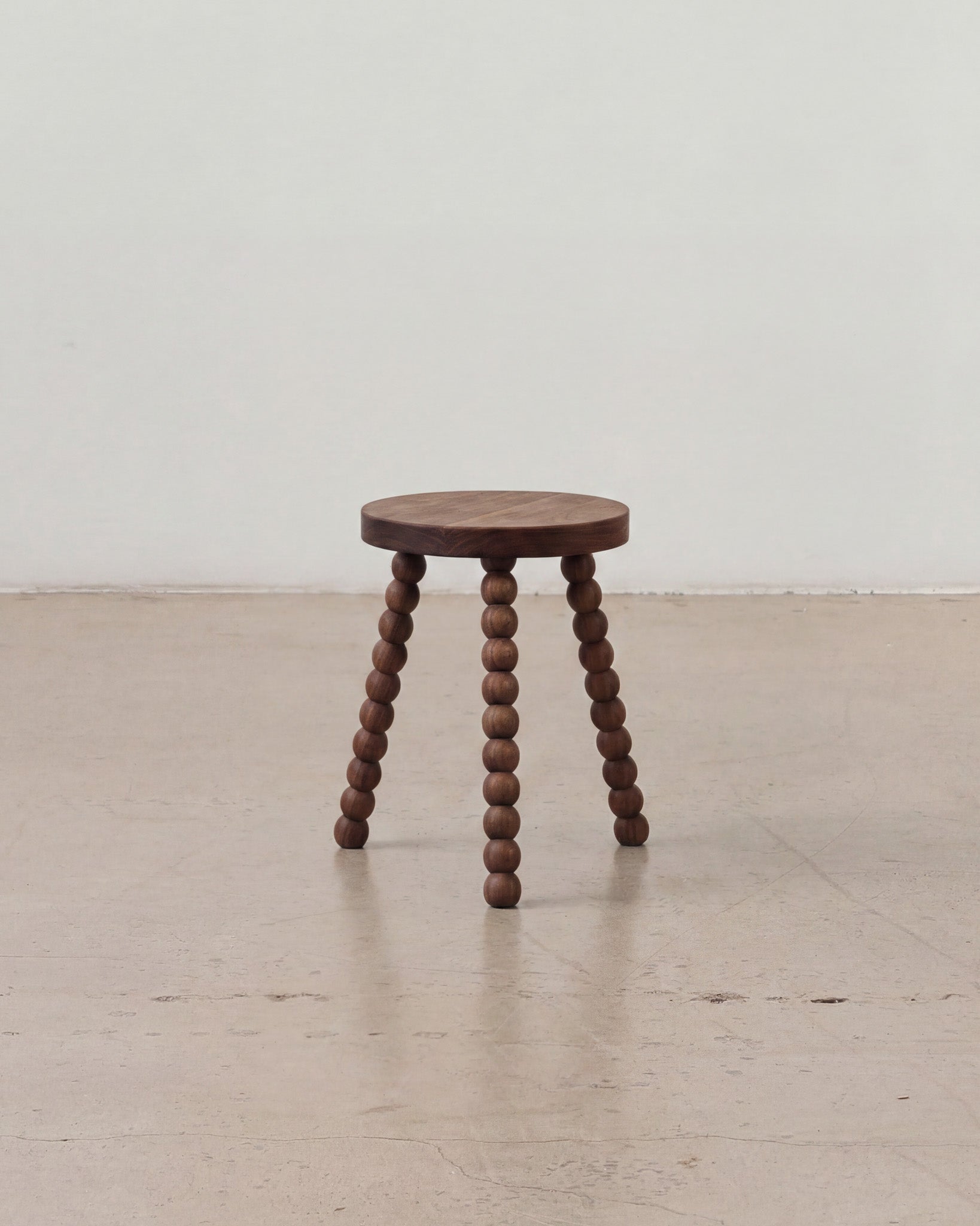 Small walnut timber stool
