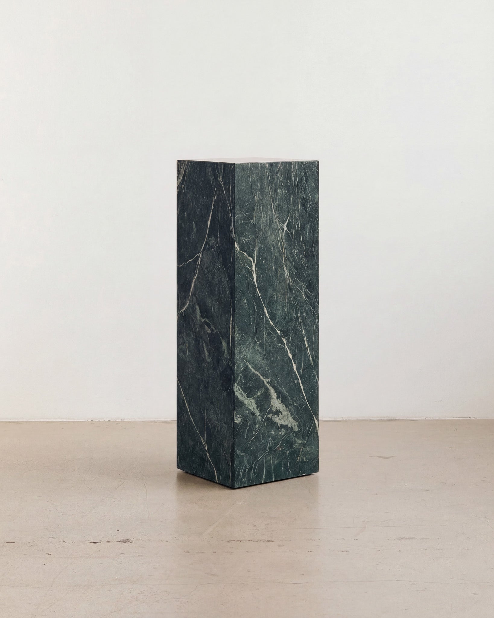 Tall marble verde plinth