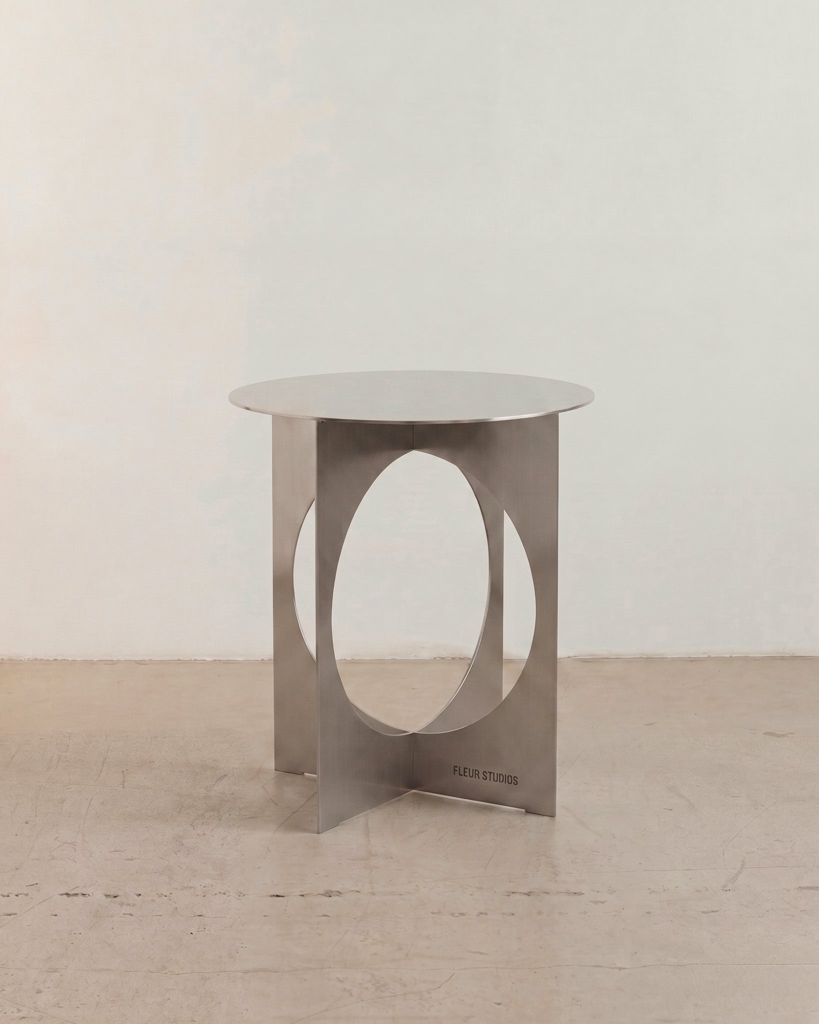 Unique stainless steel side table