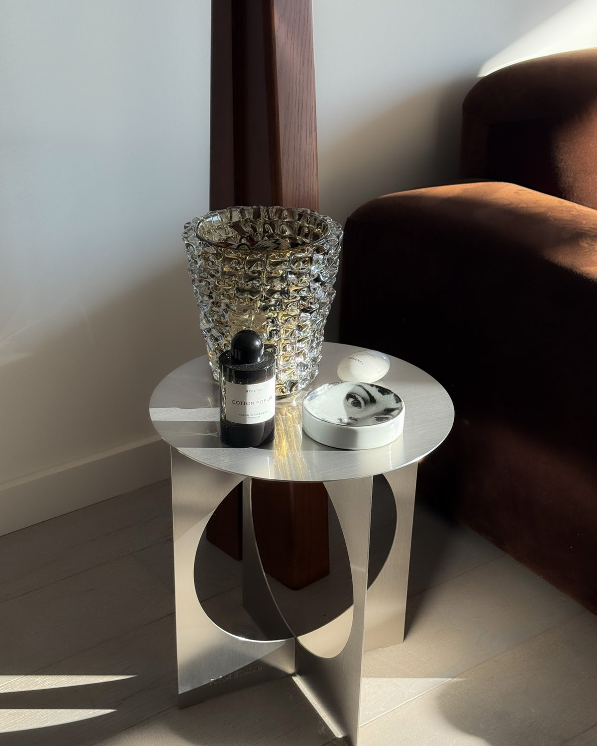 Stainless steel side table styled