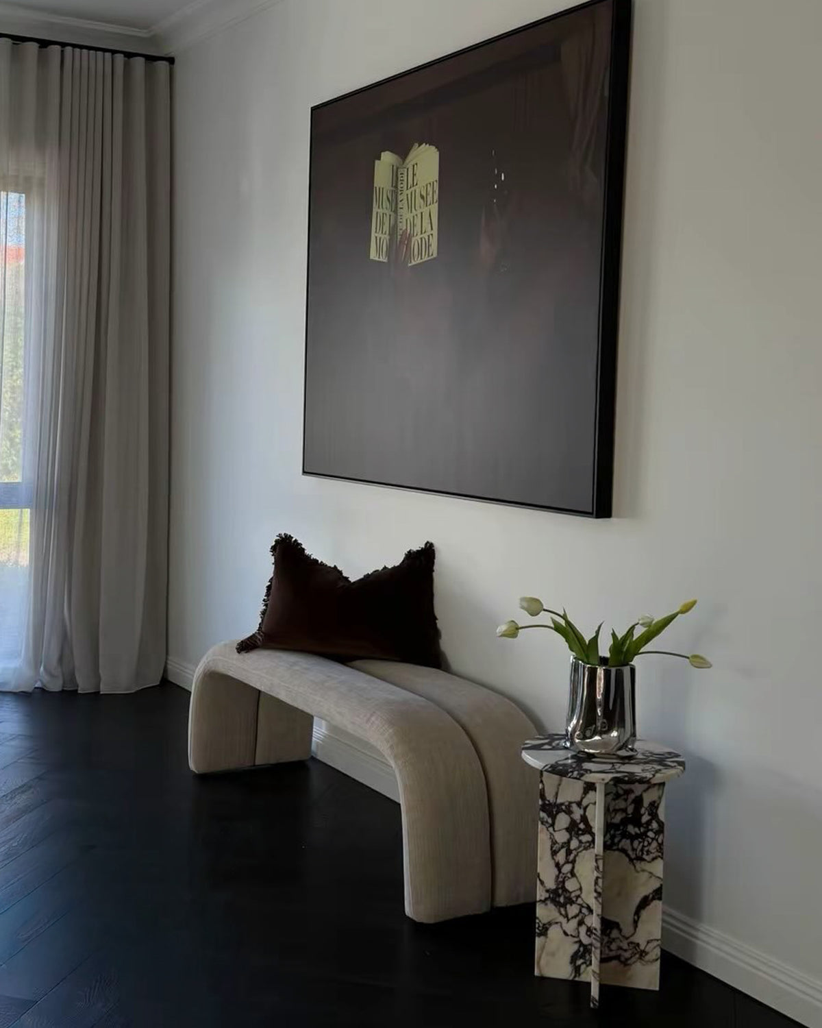 Benchseat, artwork and marble side table