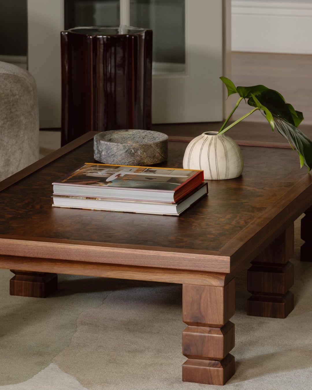 Wooden coffee table with books and decor