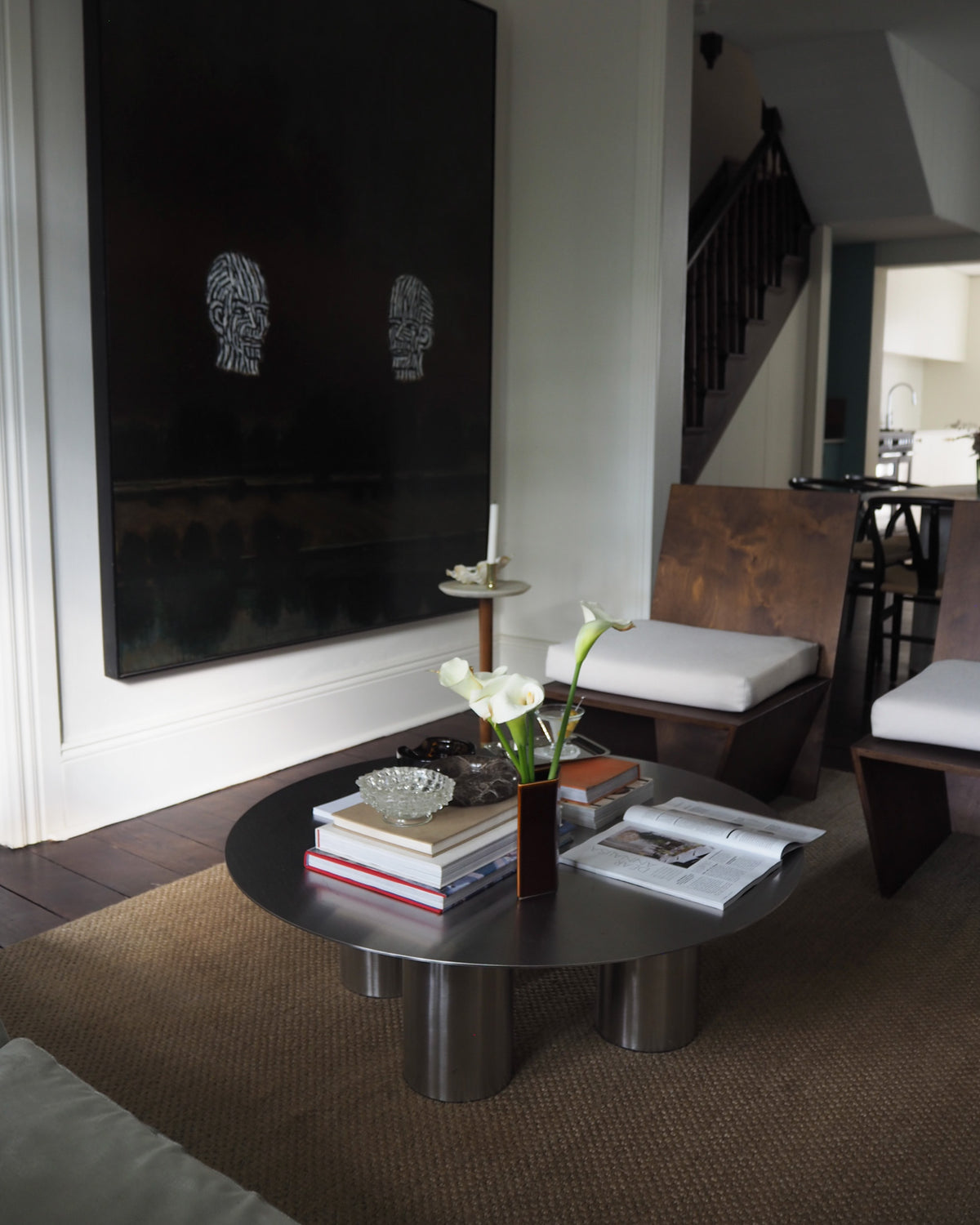 Stainless steel coffee table styled in a living room