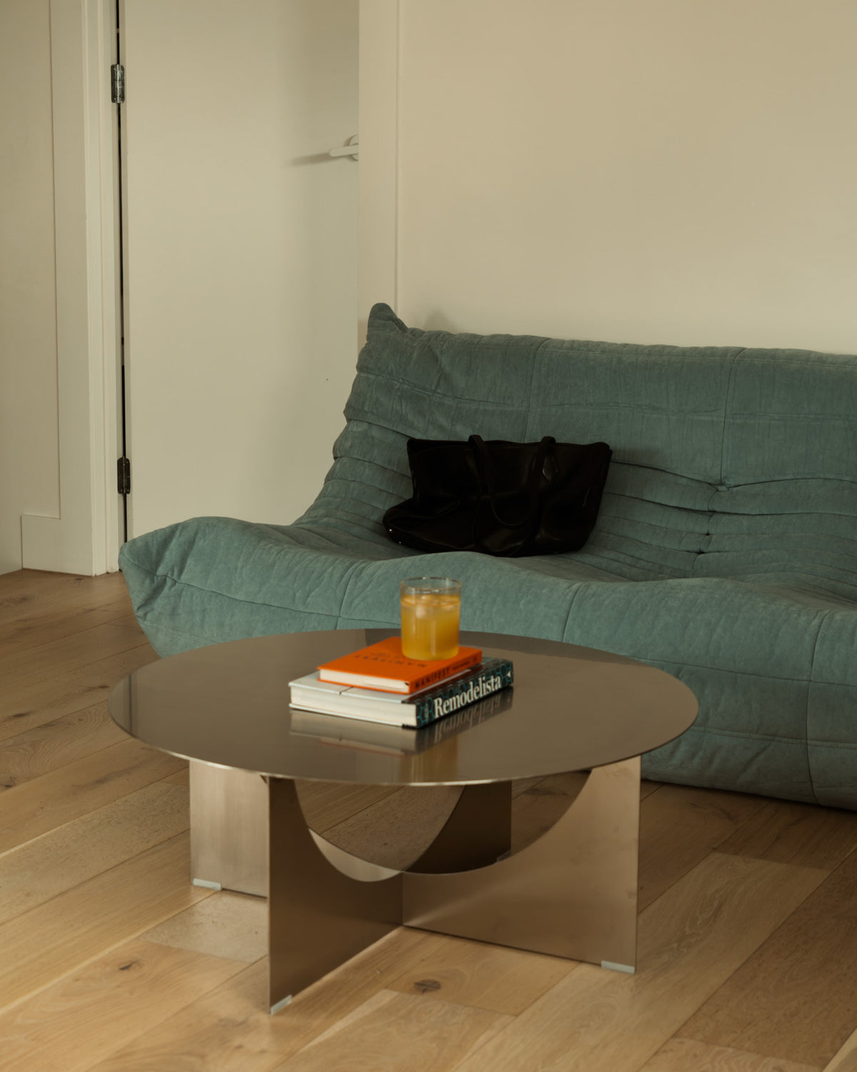 Living room styled with a stainless steel coffee table