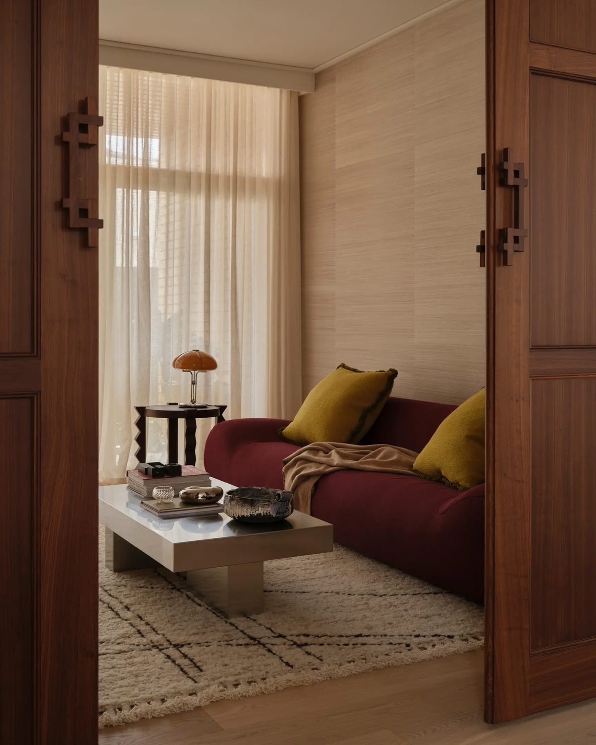 Living room styled with a stainless steel coffee table