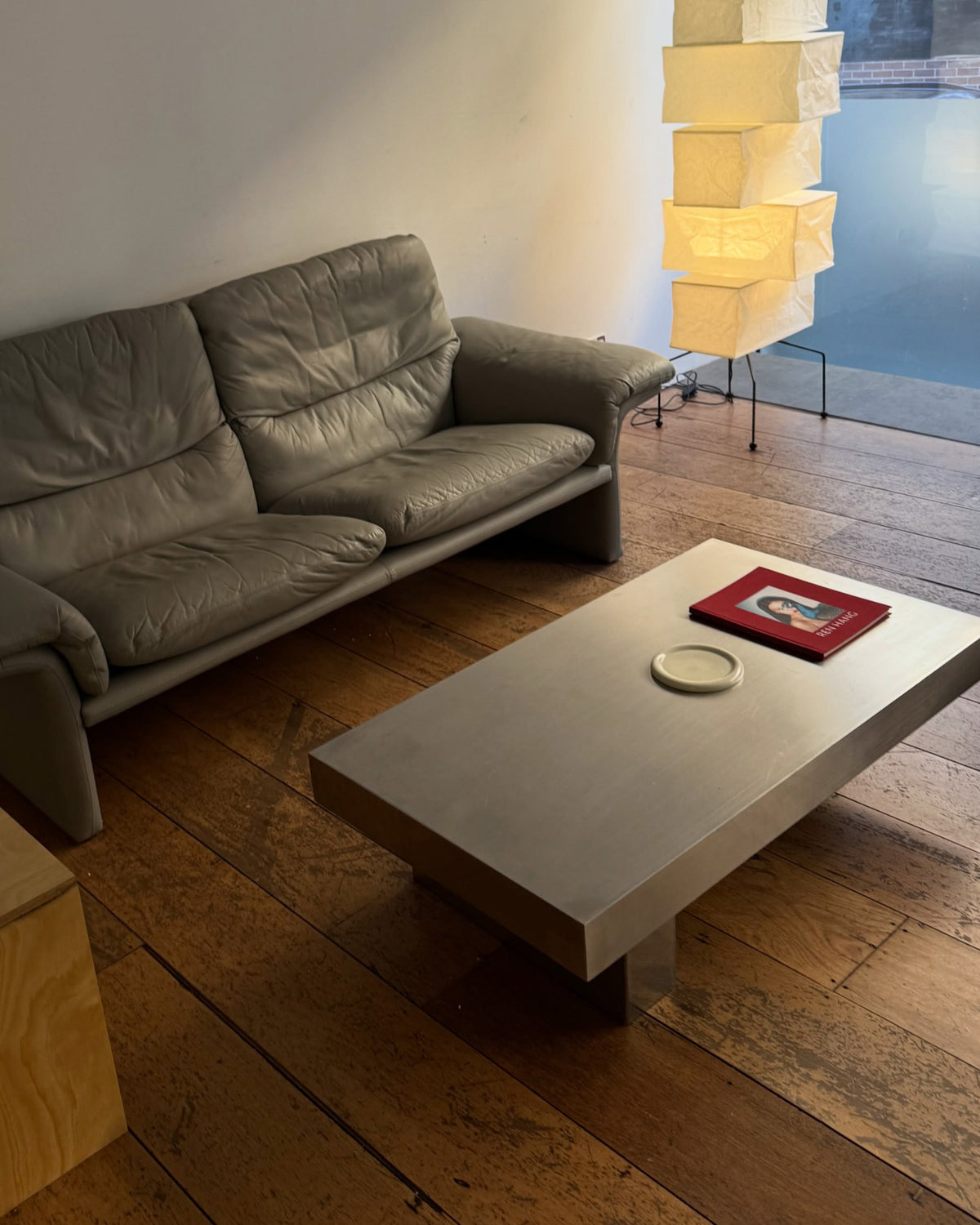 Stainless steel coffee table styled in a living room