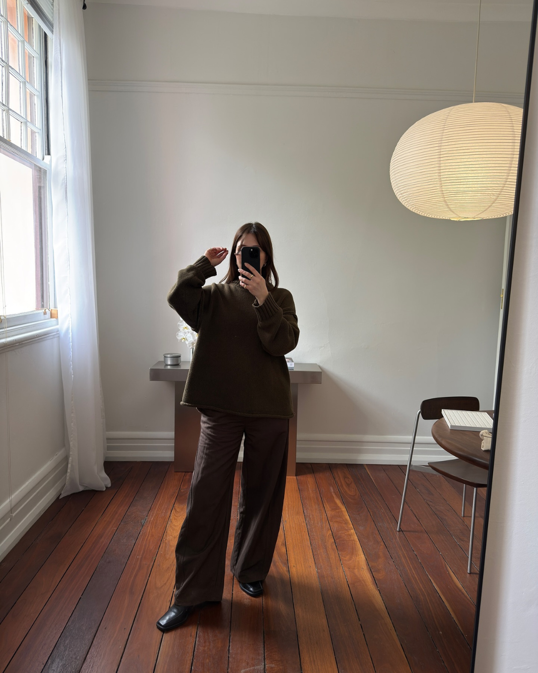Ugc selfie of Fleur Studios pieces in an apartment