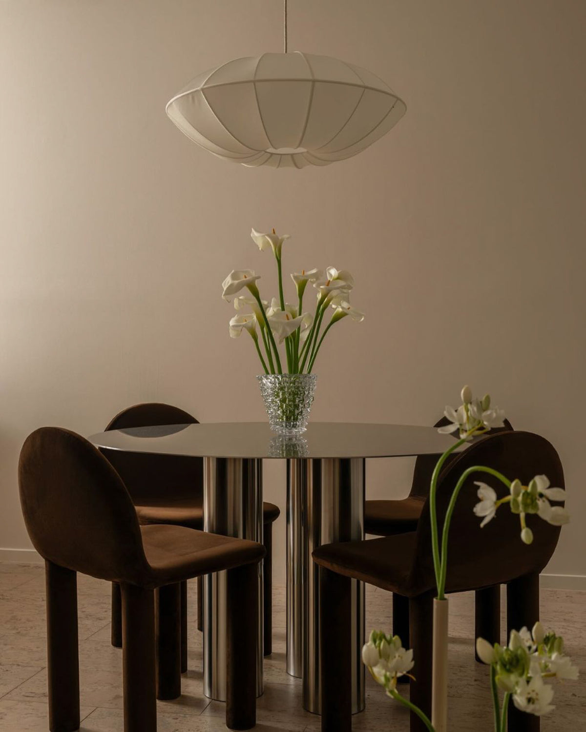 Stainless steel dining table in a dining room