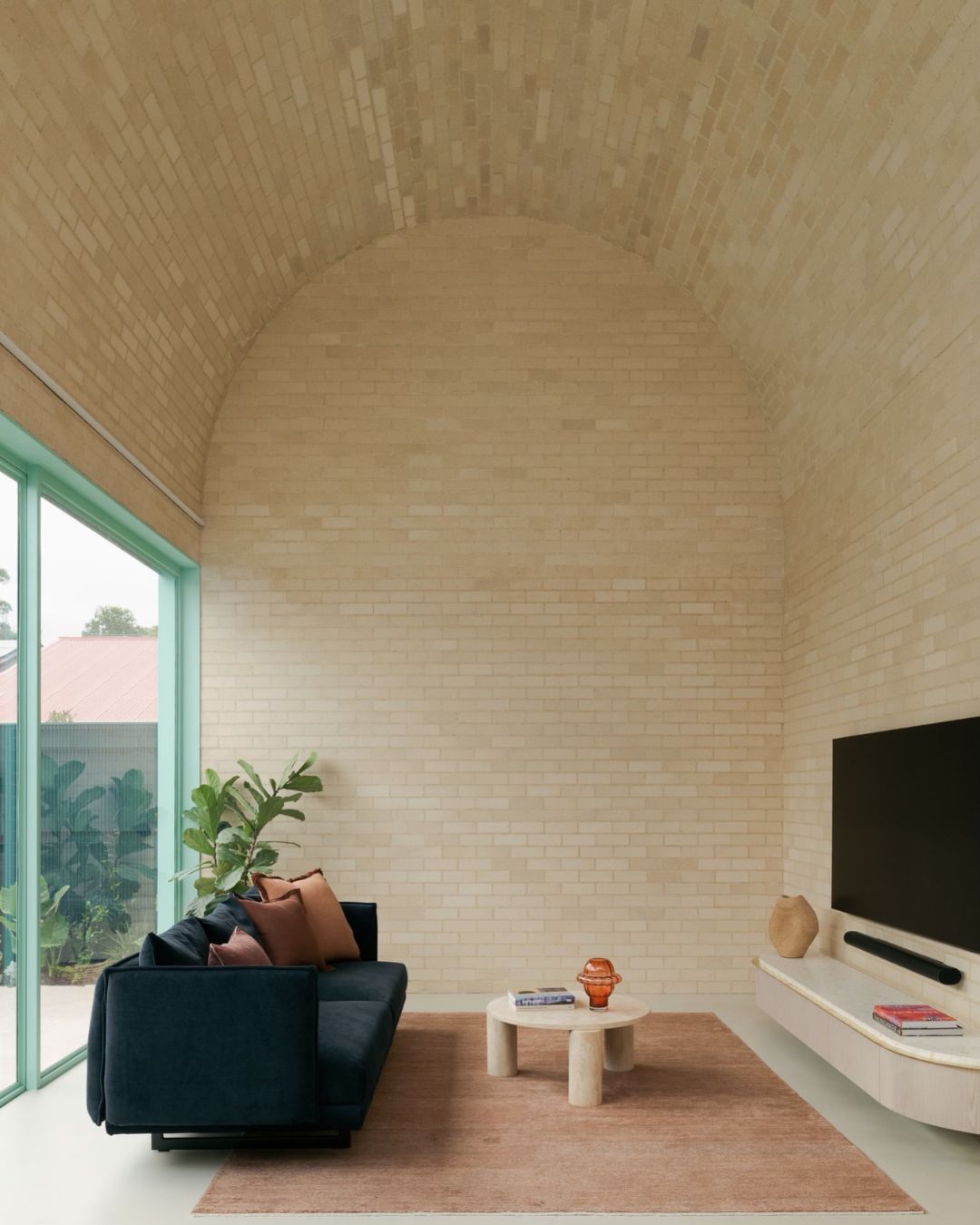 Living room with a cream travertine coffee table