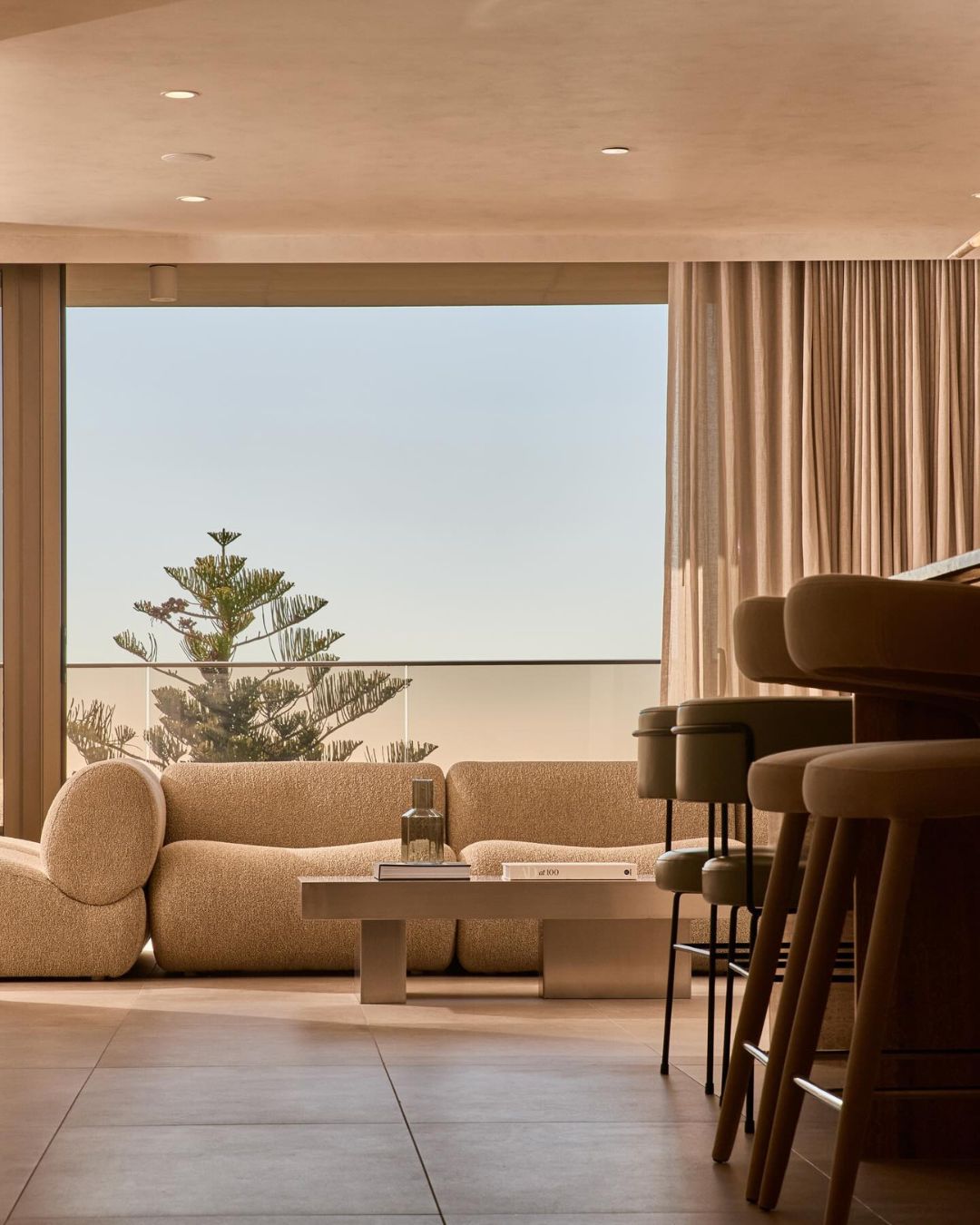 Stainless steel coffee table styled in a living room