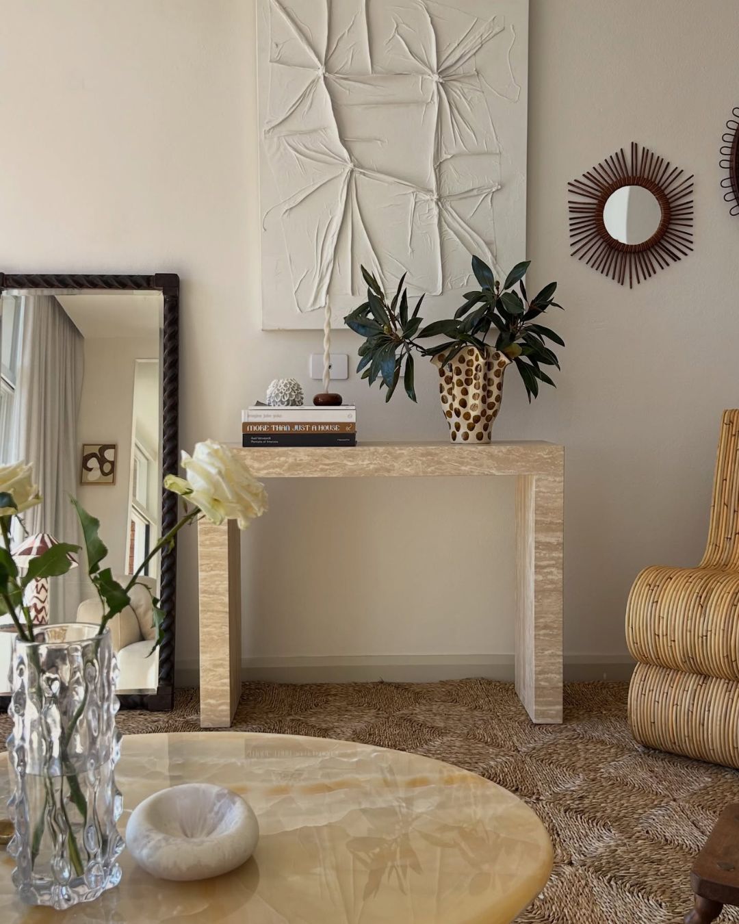 Cream travertine console table styled